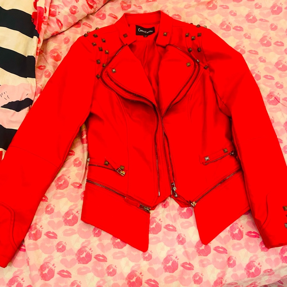 Red leather jacket , new without a tag, fashionable and eye catching